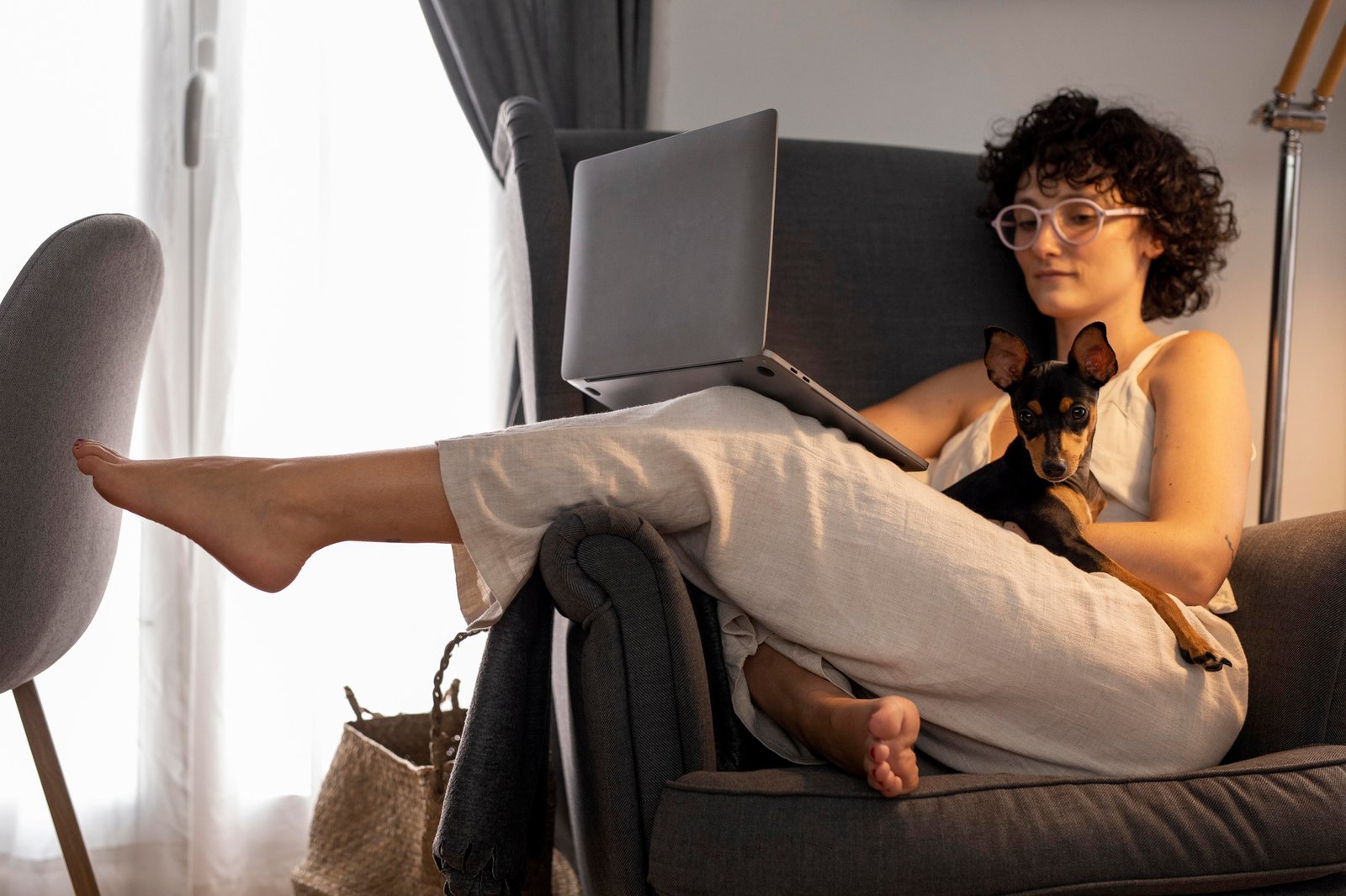 http://img.b2bpic.net/free-photo/person-working-from-home-with-pet-dog_23-2149104726.jpg