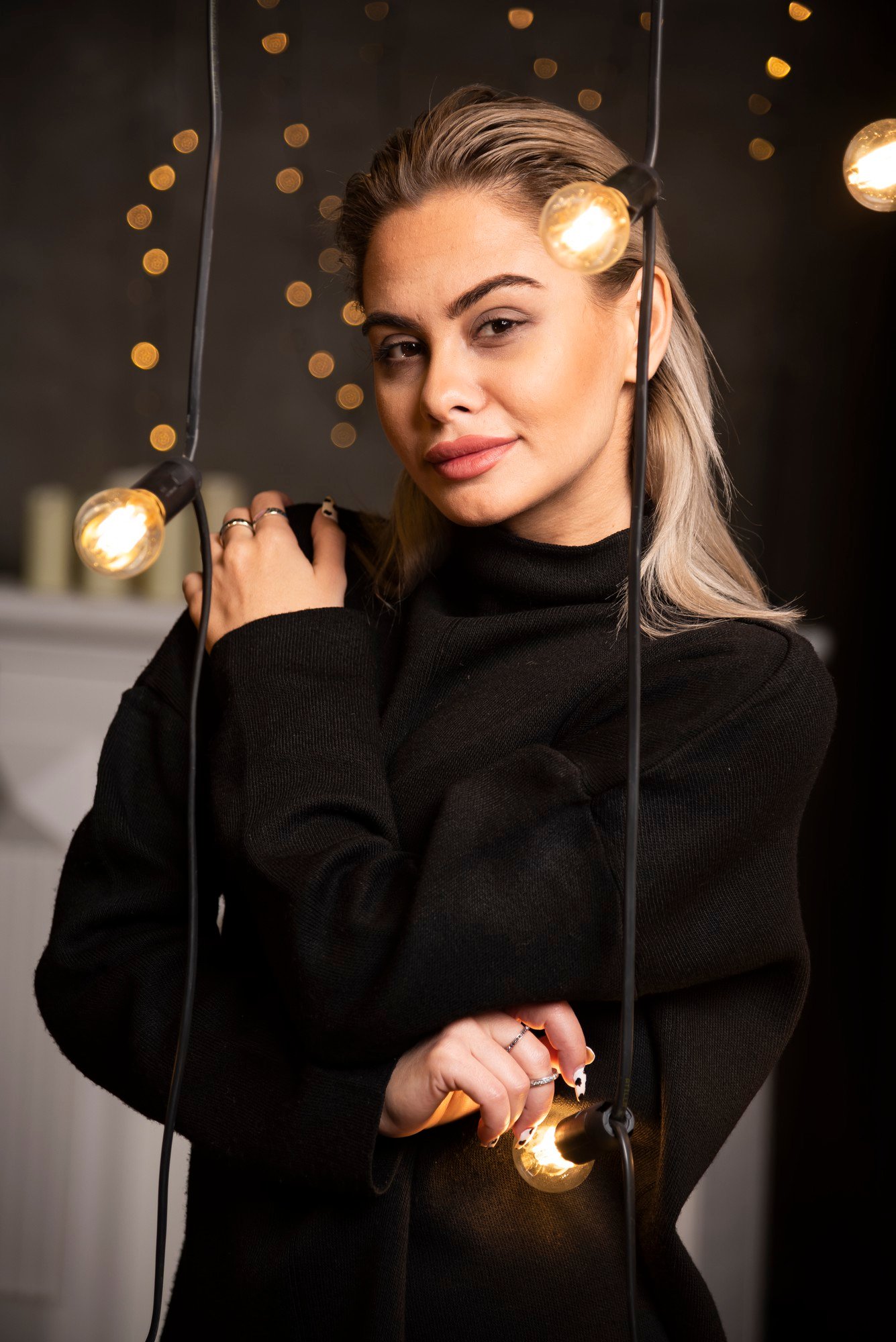 http://img.b2bpic.net/free-photo/pretty-smiling-woman-dressed-black-sweater-posing_114579-81851.jpg